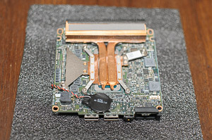 "Removing the blower fan reveals the CPU cooler"