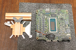 "The clean CPU die and heat pipes"