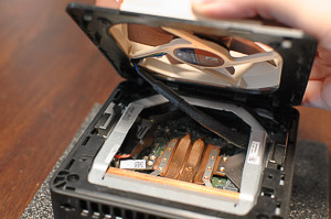 "The _Noctua NF-A9 5V PWM_ fan attached to the lid, wires connected, and ready to close"